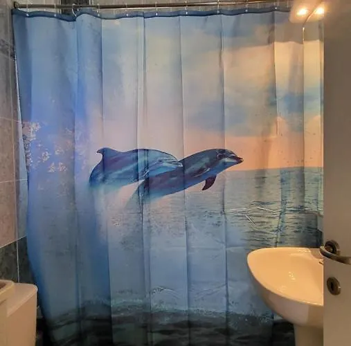 Evita Maisonette, Elegant Beachfront Apt, דירה *